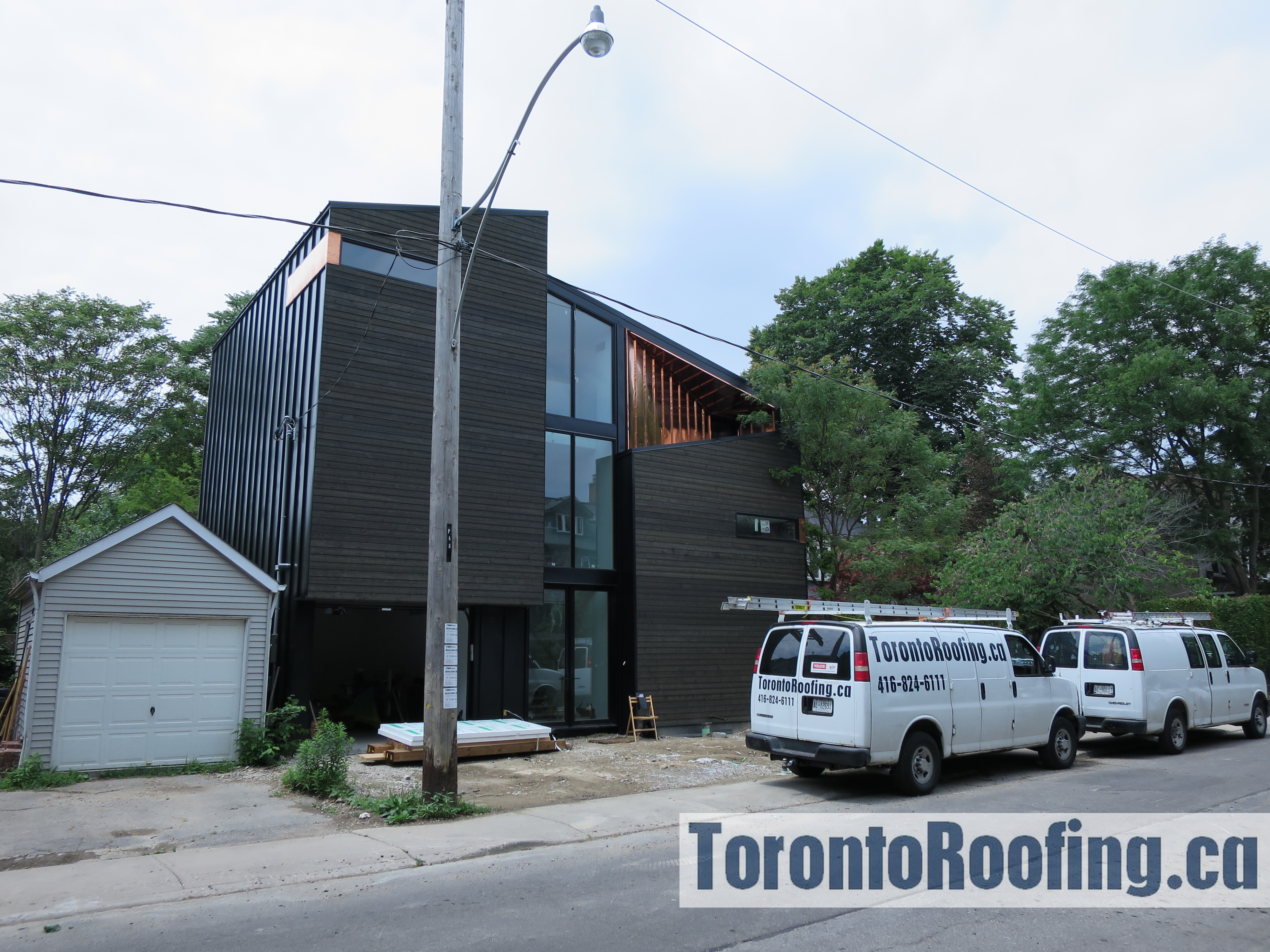 toronto-roofing-roof-siding-metal-copper-wood-modern-homes-aluminum-cladding-architeture-building-contractor-exterior-6